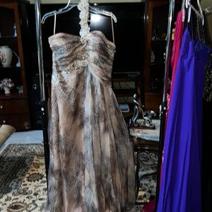 I’m selling an animal print XL wedding gown.